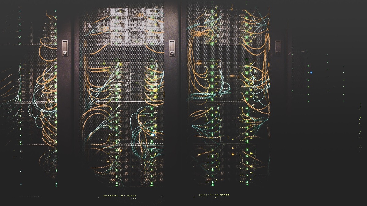 Server racks with network cabling in a data center